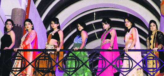 Girls participate in a fashion carnival at the Inter National Institute of Fashion Design in Ludhiana on Saturday.