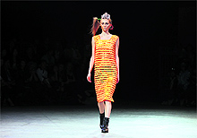 A model presents a creation by Japanese designer Yohji Yamamoto as part of his Spring/Summer 2014 women's ready-to-wear fashion show during Paris Fashion Week