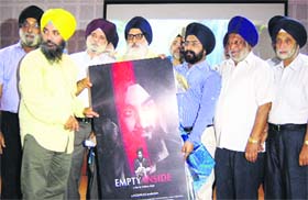 Members of Akal Purakh Ki Fauj, an NGO, during the screening of the movie titled Empty Inside at Guru Harkrishan Public School in Amritsar on Sunday.