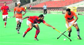 Players in action at a hockey match during the 43rd SN Vohras All-India Gurmit Memorial Hockey Tournament at Hockey Stadium, Sector 42, in Chandigarh on Sunday