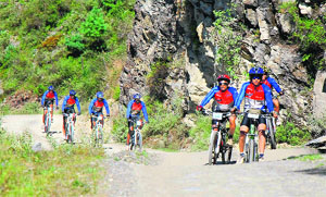 Cyclists at Gada Kuffar near Narkanda, 65 km from Shimla, on Day 2 of the Discovery Montra MTB-2013 on Sunday