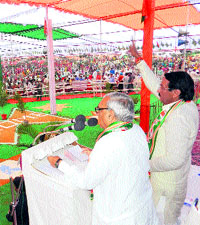 Chief Minister Bhupinder Singh Hooda addresses a public rally at Kharia in Sirsa on Sunday.
