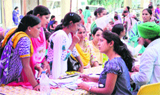 Women on the second day of the cancer screening camp at Civil Hospital, Jalandhar, on Sunday.