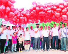 Mayor Bakshi Ram Arora and doctors take part in a marathon walk on World Heart Day in Amritsar on Sunday. 
