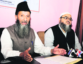 Jammu and Kashmir Jamiat-e-Ahlihadith Party president Ghulam Mohd Bhat (Al-Madni) addresses a press conference in Srinagar on Sunday.