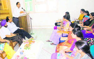 Members of the District Legal Services Authority at a seminar held at the Khalsa College for Women in Amritsar on Monday. 