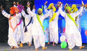 Artistes perform on the concluding day of the World Tourism Week at Sukhna Lake on Monday. 