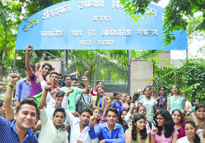 Students shout slogans during a demonstration outside Pt. Deendayal Upadhyaya Institute for the Physically Challenged in New Delhi on Monday.