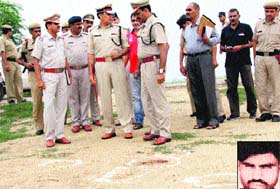 The Rohtak IG inspects the spot near Kalanaur where criminal Kolbir (inset) was shot dead on Monday
