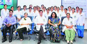A group photo of the members of the nursing staff with Dr RC Siwch, director, women medical college, after the closing ceremony of the training programme.