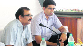 The Chief Administrator of the Haryana State Agriculture Marketing Board, TVSN Prasad (left), Deputy Commissioner Chander Shekhar address mediapersons on the premises of the India- International Terminal Market for Fruits, Vegetables, Flowers and Dairy Products near Gannaur in Sonepat.