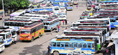 Buses parked at the general bus terminal during a transport strike in Jammu on Monday.