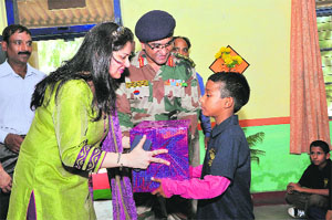 A child being felicitated at the headquarters of the Harar Kalan Regiment in Udhampur on Monday. 
