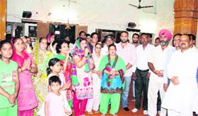 Members of the Hind Kranti Dal celebrate the 176th birth anniverary of Pt Shardha Ram Phillauri in Jalandhar on Monday.