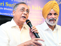 Union Minister V Kishore Chandra Deo (left) and Punjab Rural Development and Panchayat Minister Surjit Singh Rakhra in Mohali on Monday. 