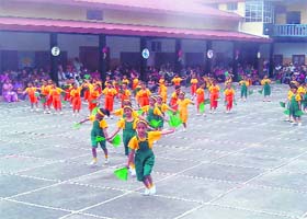 Tiny-tots of CJM Hampton Court School present a go-green item during the annual sports day function in Mussoorie on Tuesday