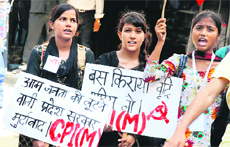 Girls participate in a protest organised by the CPM against the bus fare hike at Hamirpur on Tuesday.
