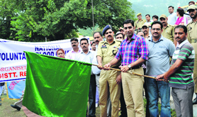 Reasi DDC Dr Shahid Iqbal Choudhary flags off a rally to mark the World Blood Donors' Day in Katra on Tuesday.