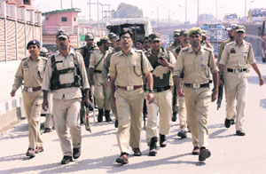 Security personnel patrol outside the Jammu and Kashmir Assembly Complex in Srinagar on Tuesday. 