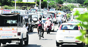 Commuters stranded in a traffic jam during a Youth Akali Dal rally in Ludhiana.