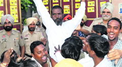 Veer Bhan rejoices with his supporters after being elected as the president of the Safai Karamchari Union in Bathinda on Wednesday. Tribune photo: Pawan Sharma