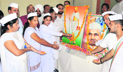 Congress workers pay floral tributes to Mahatma Gandhi and Lal Bahadur Shastri on their birth anniversary at Congress Bhawan in the city on Wednesday. Tribune photo: Pawan Sharma 