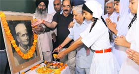 Students and staff pay tributes to former Prime Minister Lal Bahadur Shastri on his birth anniversary at Shastri Model School, Phase I, Mohali, on Wednesday