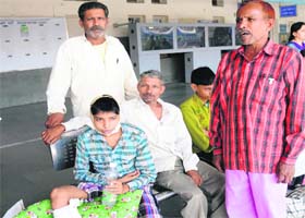 Ailing Vikas with his father at the Chandigarh railway station