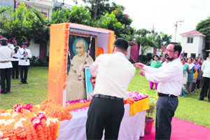 DGP BS Sidhu pays tributes to Mahatma Gandhi and Lal Bahadur Shastri on their birth anniversaries at the Police headquaters in Dehradun on Wednesday.