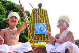 Children, dressed up as Mahatma Gandhi, spread the message of peace and brotherhood