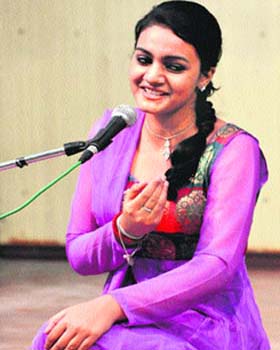 A participant performs during a talent contest at the University of Jammu on Wednesday