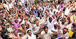 Pakistan-occupied Kashmir refugees raise slogans during a protest in support of their demands in Jammu on Wednesday