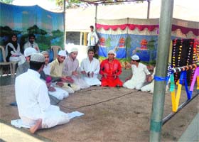 Students of Government Boys Higher Secondary School, Shalimar, perform during a valedictory function in Srinagar on Wednesday
