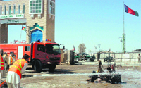 A firefighter in action at the site of a suicide blast in Chaman town, Pakistan, on Wednesday.  AFP