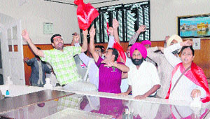 CPI activists protest inside the DCs office in Amritsar on Thursday. 