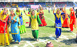 Students perform giddha during the opening ceremony of the Punjab State Games for Women in Bathinda on Thursday
