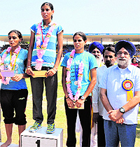 Winners of the 800 metre race being felicitated by Education Minister Sikandar Singh Maluka