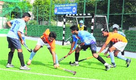 Players of RCF Kapurthala and ITBP Jalandhar in action during the semifinal match of the Olympian Dharam Singh Memorial Hockey Tournament held in Mohali on Thursday.
