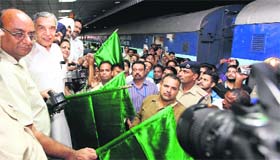 MP Pawan Kumar Bansal flags off the train at the Chandigarh railway station on Thursday.
