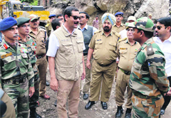 Union Minister of State for Defence Jitender Singh Bhanwar meets BRO personnel in Dharchula subdivision of Pithoragarh district on Thursday.
