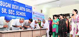 Grandparents participate in a game on the occasion of Grandparents Day celebrated by the Inner Wheel Club in Ladwa.