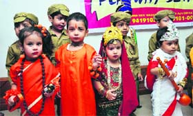 Children participate in the Grandparents Day function organised by Lord Mahavira Play Way School in KL Sehgal Hall in Jammu on Thursday