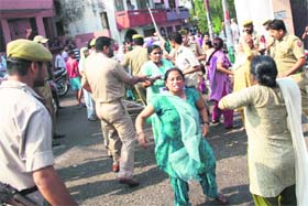 Protesters clash with the police in Jammu on Thursday