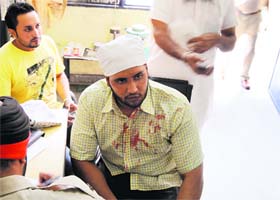 The injured youth records his statement with the police after the attack in Ludhiana