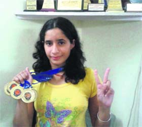 Ishpreet Kaur Mann shows her medals