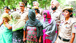 The police with the accused in Amritsar on Friday
