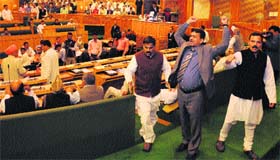 Panthers Party MLAs stage a walkout from the Legislative Assembly in Srinagar on Friday.