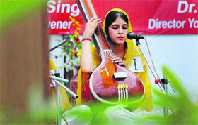A girl participates in a shabad-recitation competition during the PU Zonal Youth and Heritage Festival at the Partap College of Education in Ludhiana on Friday. 