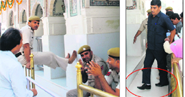 A Haryana Police personnel sits on a railing with his feet supported by a pillar facing the darbar; and (right) a commando accompanying the Haryana Chief Minister enters the shrine wearing shoes at the Mansa Devi temple in Panchkula on Saturday. 