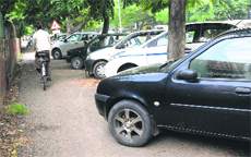 A vehicles parked on a cycle track in Sector 19.